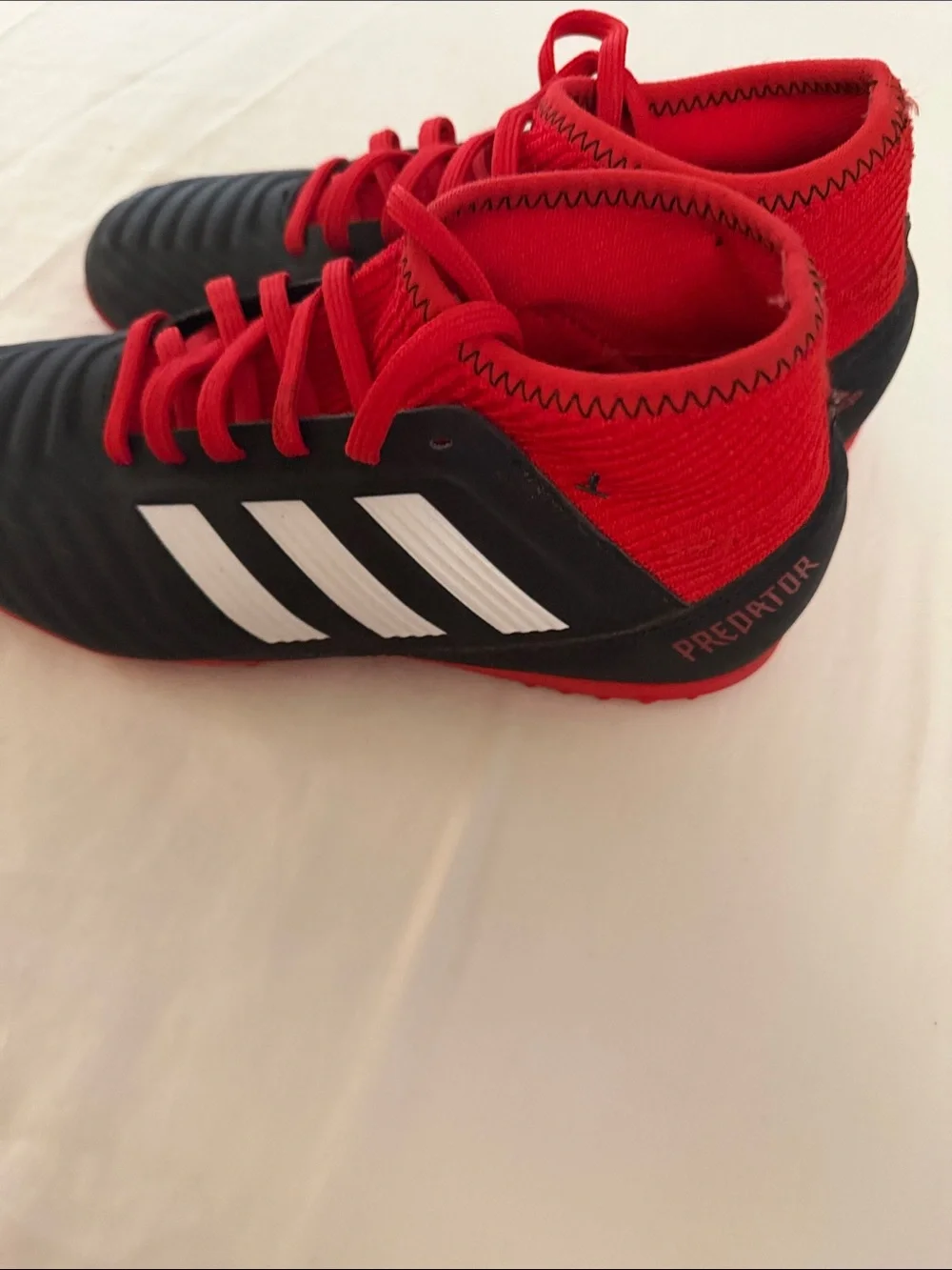 adidas Kids Black and Red Mid-Top Soccer Sneakers